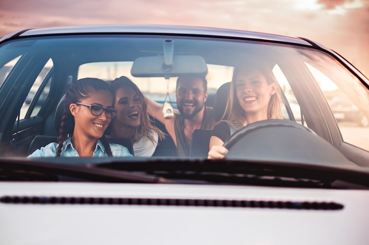 image of a group of people in a car